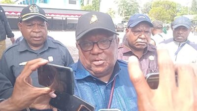 (Wakil Ketua IV DPR Papua Tengah, John Gobai)