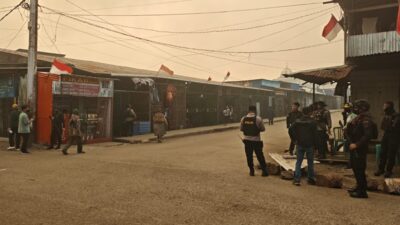(Polres Dogiyai Intensifkan Patroli Sore di Kota Moanemani, Situasi Tetap Kondusif)